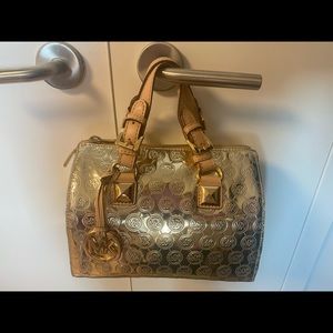 Michael Kors Logo small Duffle Bag(Gold)